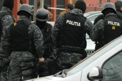 Percheziții într-un dosar de pornografie infantilă